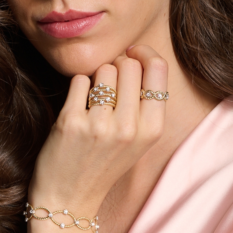 Anello Intrecci ovali fiori oro 18kt