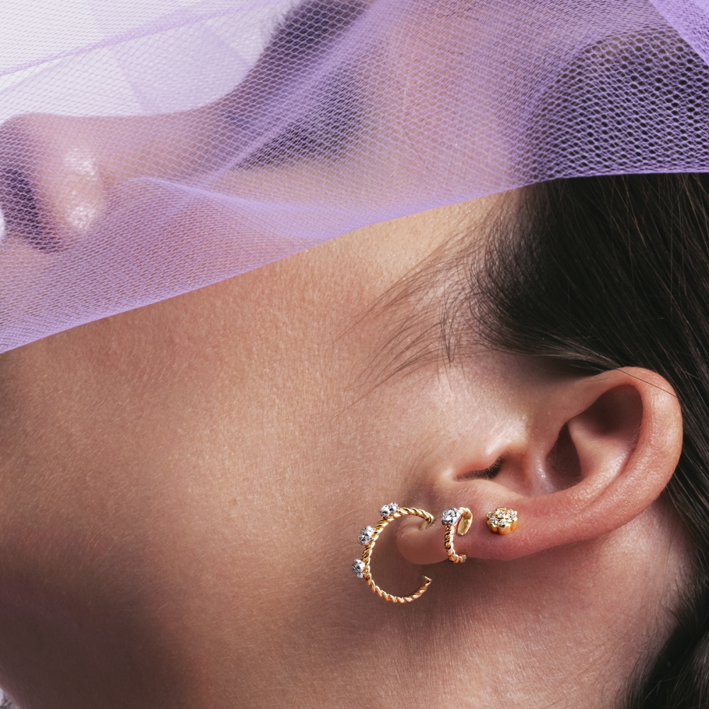 Orecchini Intrecci fiori piccoli oro 18kt 2